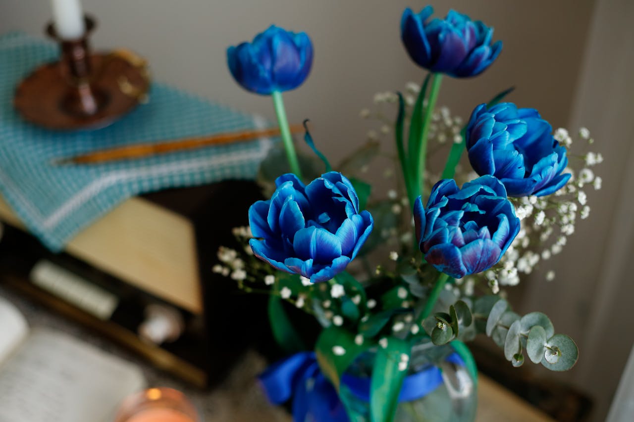 vase containing artificial flowers is often the best option to brighten up a space